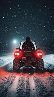 Snowy Night ATV Adventure Through the Wilderness photo