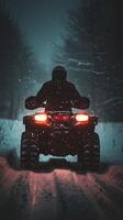 Night ATV Adventure in Snowy Forest photo