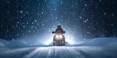 Snowy Night Adventure on a Snowmobile photo