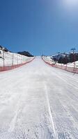 Snowy Ski Slope Extends to the Horizon photo