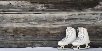 Elegant Ice Skates Against a Rustic Wooden Wall photo
