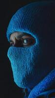 Mysterious Figure in a Deep Blue Mask photo