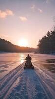 Winter Adventure on Frozen Lake at Sunrise photo