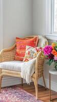Wicker Corner Chair with Cozy Throw and Flowers photo