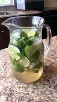 Refreshing Iced Mojito in a Glass Pitcher photo