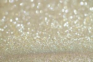 Gold glitter background with bokeh effect photo