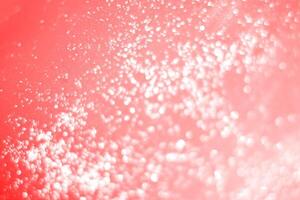 A red and pink background with bubbles photo