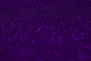 Purple glitter background with a black background photo