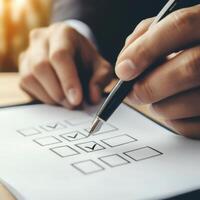 Planning and organizing tasks with a checklist in a professional setting during daylight hours photo