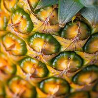 Close-up view of ripened pineapple skin highlighting its vibrant colors and unique texture photo