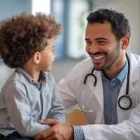 Doctor smiling while consulting with young child in medical office, creating a friendly atmosphere during check-up photo