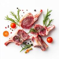 Freshly cut lamb chops garnished with herbs and spices for flavorful cooking ideas photo