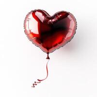 Red heart-shaped balloon floating elegantly with a curly ribbon against a clean white background photo
