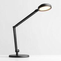 Modern black desk lamp with adjustable arm, perfect for home office or study use photo