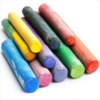 Colorful chalk pieces arranged artistically on a neutral background, showcasing vibrant hues and textures for creative expression photo