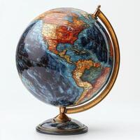 Decorative globe showcasing the Americas with rich colors and vintage design on a sturdy base photo