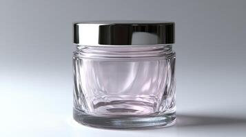 A beautifully designed glass jar with a shiny metal lid, ideal for cosmetics and skincare items photo