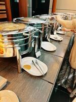 Lined up in the hotel buffet are several machines dedicated to keeping the food at the right temperature. photo