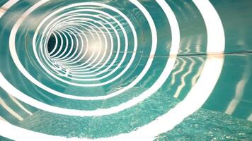 Experience an exhilarating ride through a twisting, turning water slide featuring dynamic splashes and eye catching spiral patterns video