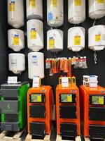 Kyiv, Ukraine - January 03, 2025 Display of water heaters and boilers in a hardware store photo