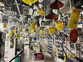 Kyiv, Ukraine - January 03, 2025 Illuminated Lighting Store Displaying Lamps and Fixtures With Price Tags Visible photo
