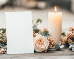 Elegant wedding invitation card with soft rose and candle ambiance photo