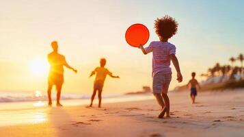 family enjoys playing frisbee on sunny beach at sunset, creating joyful memories photo