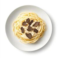 plate of truffle spaghetti with rich creamy sauce, garnished elegantly photo
