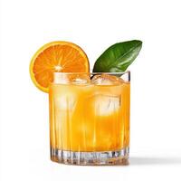 Refreshing glass of orange juice with ice and slice of orange photo