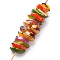 Grilled chicken skewer with colorful vegetables, perfect for summer meals photo