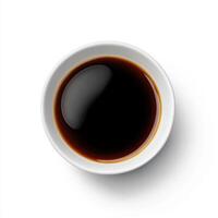 top view of bowl filled with dark soy sauce, showcasing its rich color and glossy surface. Perfect for culinary use photo