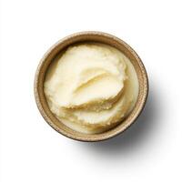 Creamy horseradish sauce in rustic bowl, perfect for enhancing dishes photo