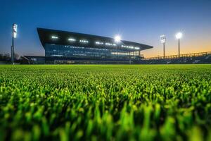 A Vibrant Soccer Stadium Grass Setting Under Bright Stadium Lights photo