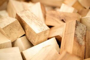Workers check the quality of timbers in a warehouse, supporting efficient operations. photo