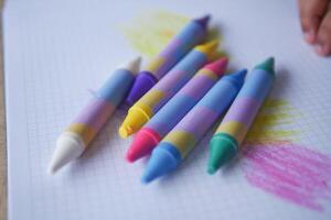 A Collection of Colorful Crayons on Graph Paper for Fun Creative Projects photo