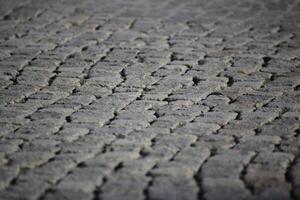 Set paved ground with selective focus effect usable as background. photo