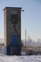 Small German switchgear building in a winter landscape near Greifswald, Mecklenburg-Vorpommern. photo