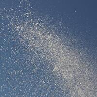 Water drops spraying from a fountain. photo