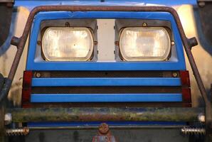 Front of an old tractor. photo
