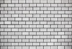 Wall made from white bricks usable as background or texture. photo