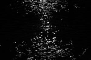White light effect on water in hourglass shape photo