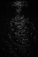 White light effect on water in hourglass shape. photo