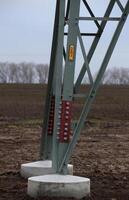 High voltage sign on power line frame in Germany. photo