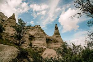 Landscape of snowy mountains high, mountain range in haze summer photo