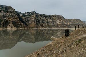 Landscape of fine mountains, mountain range in haze summer photo