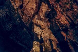 Red journey underground cave, corridor ceiling in hole of mountain photo
