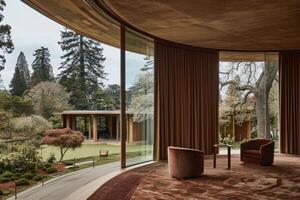 Modern Interior Design Featuring Curved Window and Garden View photo