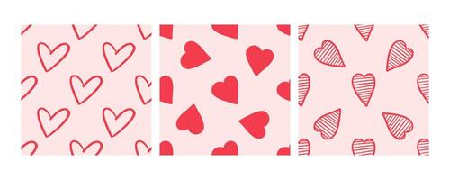 Seamless patterns with red hearts on a pink background in doodle style vector