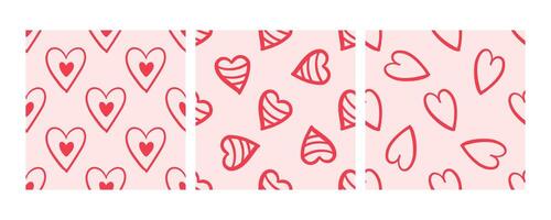 Red hearts seamless patterns on pink background drawn in doodle style vector