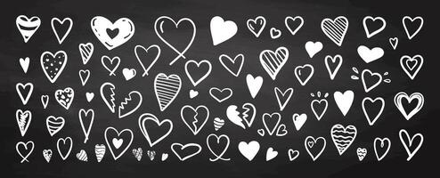 Collection of hand-drawn white heart shapes in flat doodle style on chalkboard background vector